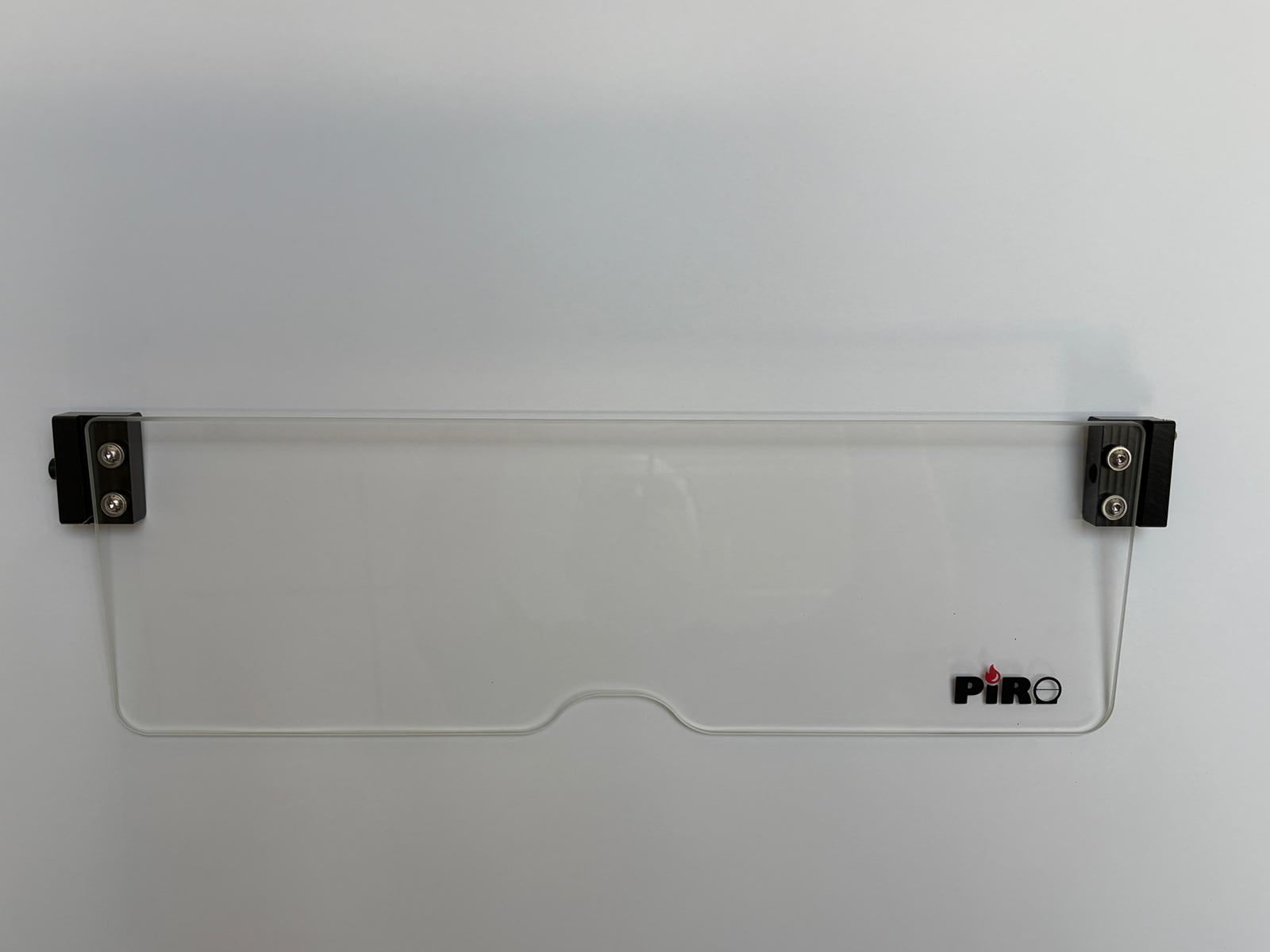 Clear glass window with metal clips on a white background