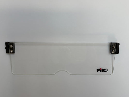 Clear glass window with metal clips on a white background