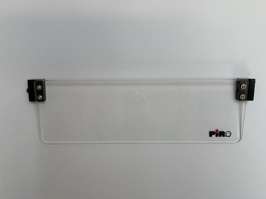 Clear glass window with metal clips on a white background